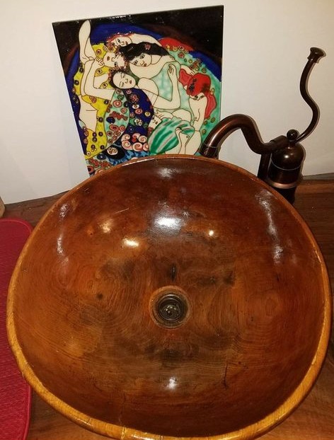 round sink that looks wooden